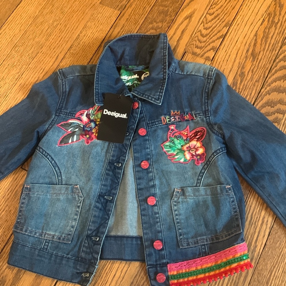 Kids size 7/8 desigual denim jacket with patches and “tropical queen” on back